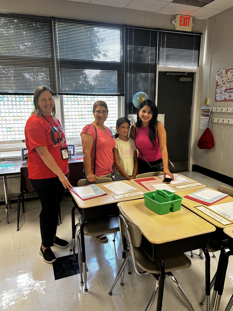 teacher meets with family