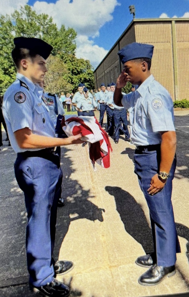 ROTC students folding the flag