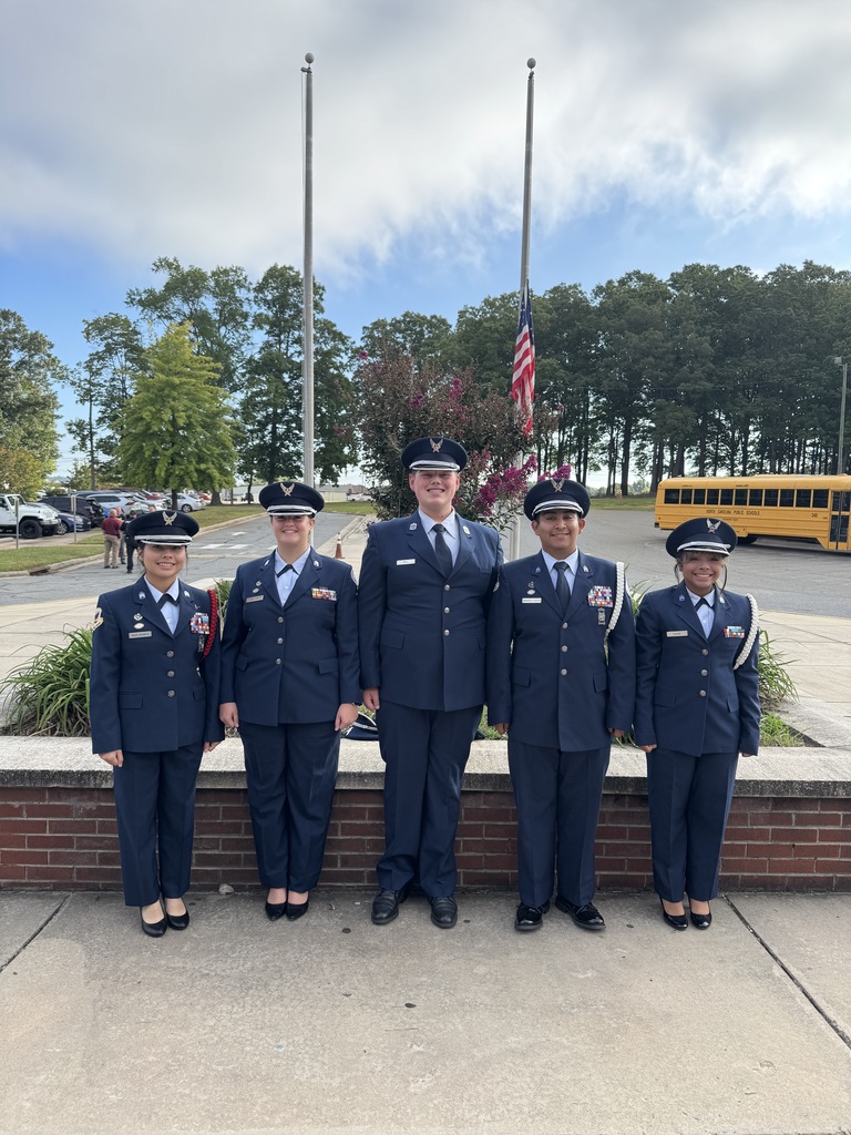 Cadets in front of the flagpole