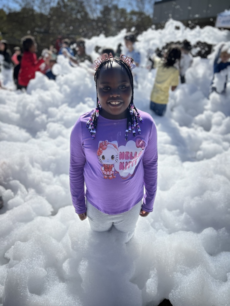female student stands in foam