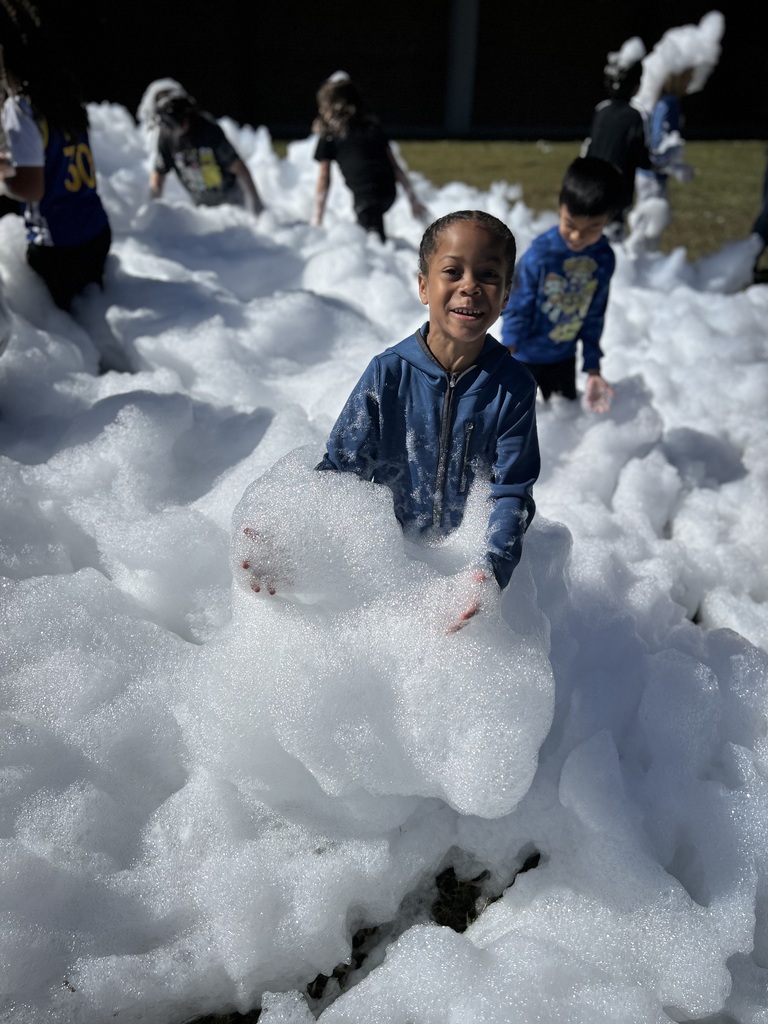 female student stands in foam