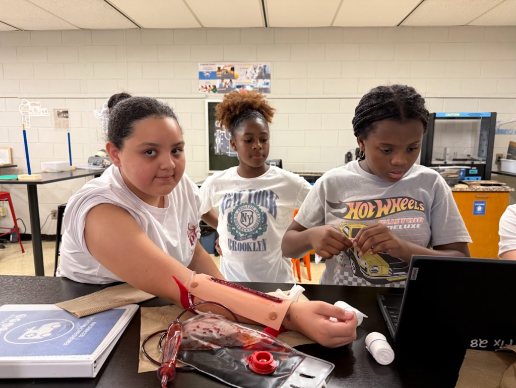 wrapping a bleeding wound in EMT