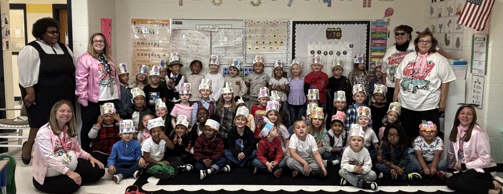 Kindergarten crew photo wearing 50th day of school hats with teachers.