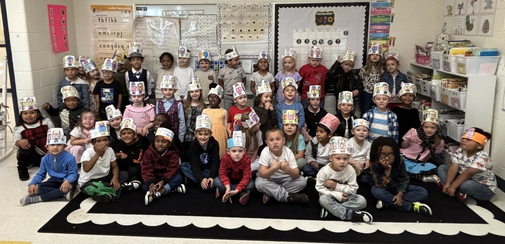 Kindergarten crew photo wearing 50th day of school hats without teachers.