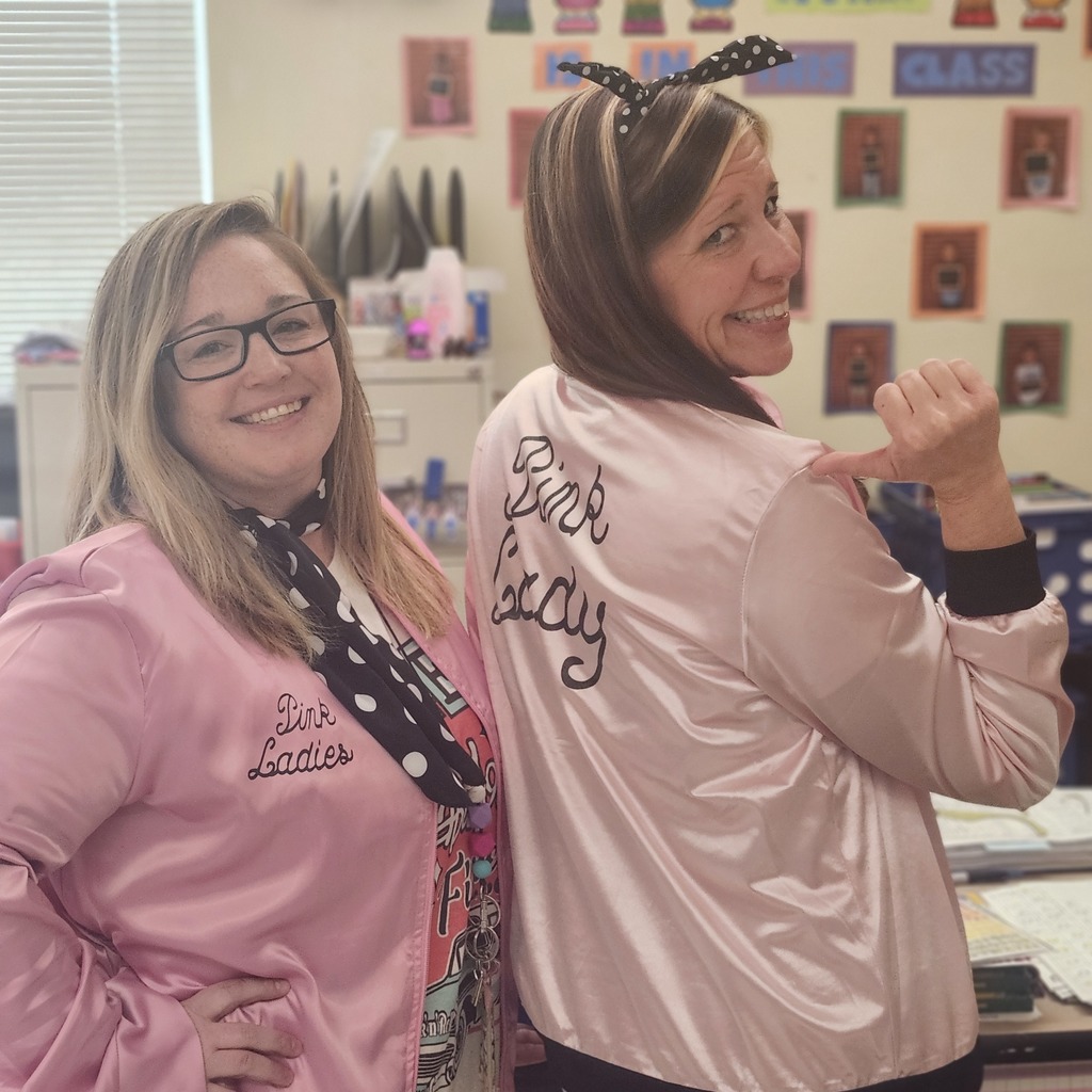 Mrs. Carter and Mrs. Cox dressed up as pink ladies.