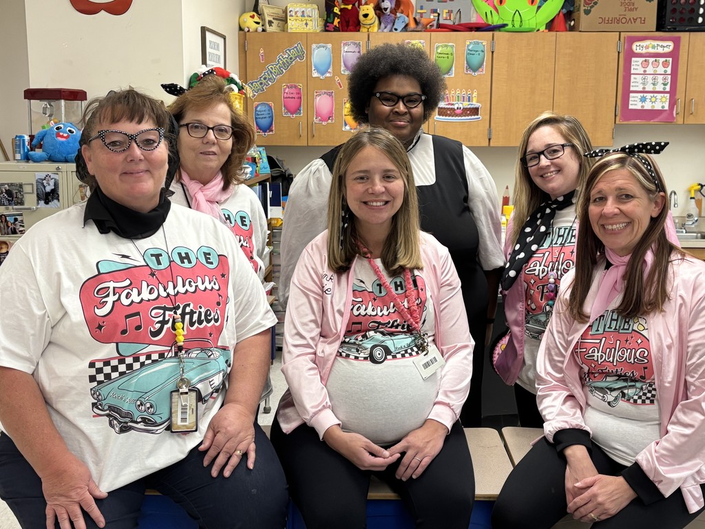 The Kindergarten Team wearing matching fabulous 50's shirts.