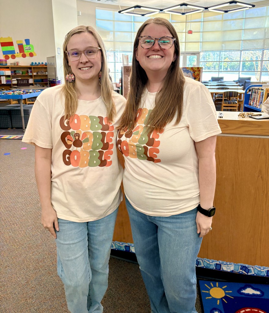 Mrs. McDonough and Ms. Jay twinning in "Gobble Turkey" shirts for twin day!