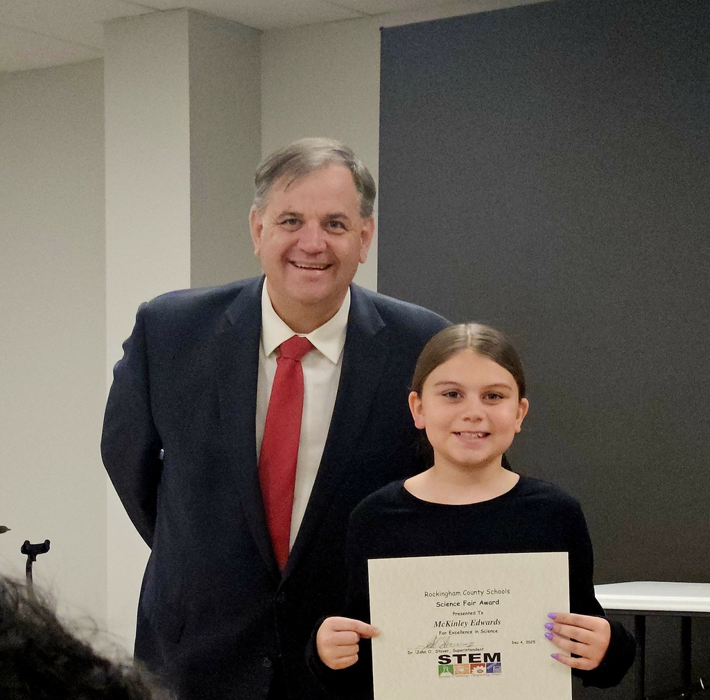 student with superintendent