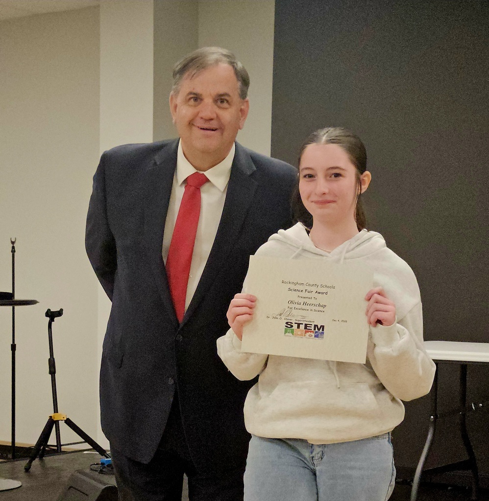 student with superintendent