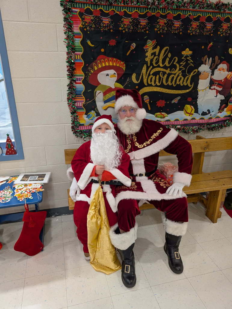 Kid and adult Santa at Bethany Elementary
