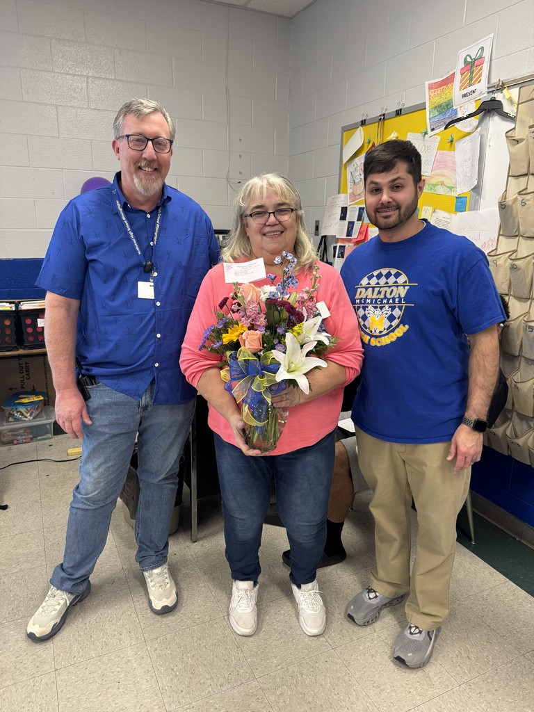 McMichael High School's Teacher of the Year Mrs. Lynch!  Pictured with Assistant Principal's Chris Higgs and David Edrington.
