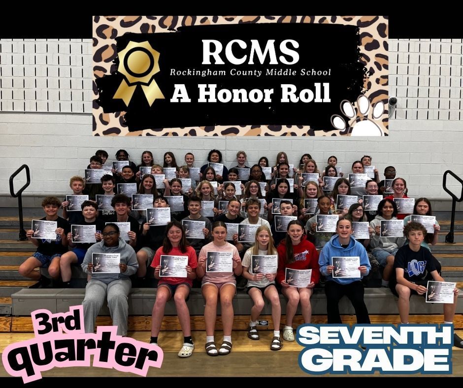 7th grade a honor roll students posing on bleachers with certifcates