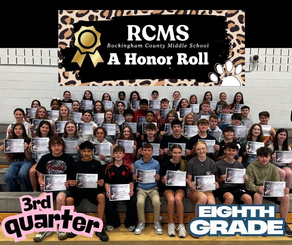 8th grade A honor roll students posing on bleachers with certificates