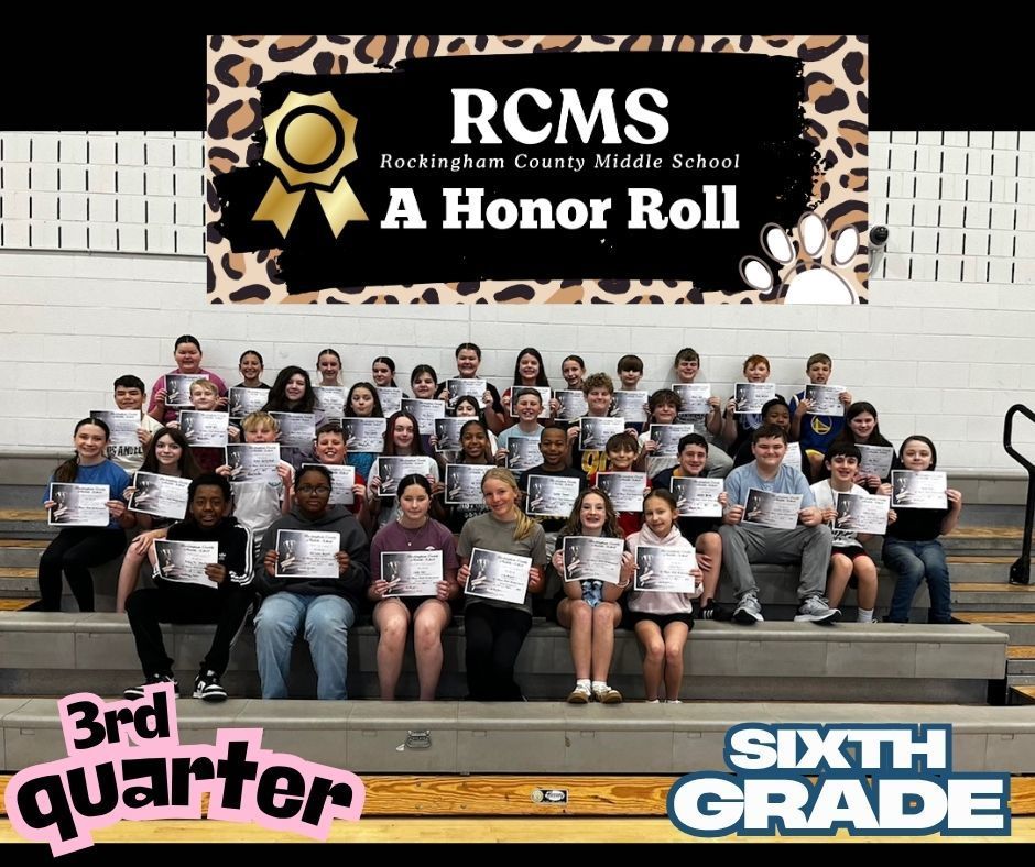 6th grade A honor roll students posing on bleachers with certificates