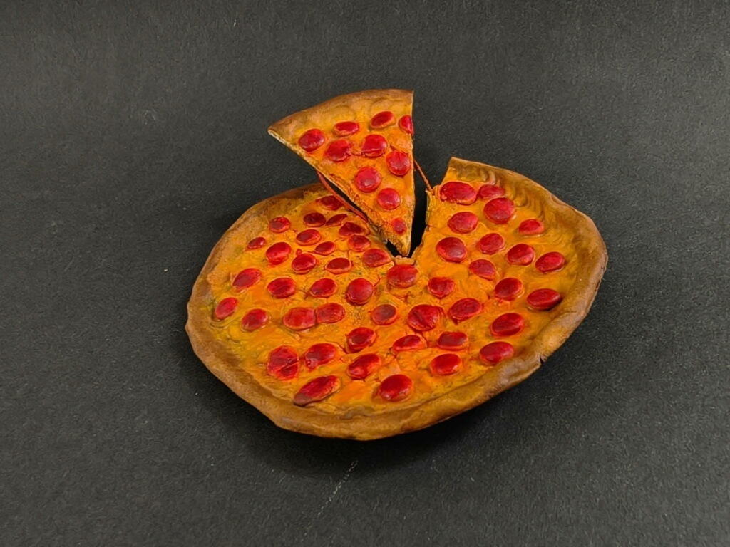 student art floating pizza
