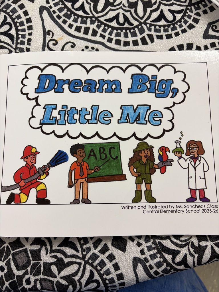 The cover of a children's book titled "Dream Big, Little Me" is displayed. The title is written in blue bubble letters with black outlines, set within a white cloud-like shape. Below the title are four cartoon children depicted in different career roles from left to right: a firefighter holding a hose, a teacher pointing to a blackboard with "ABC" written on it, an explorer or safari guide holding a parrot, and a scientist in a lab coat holding a beaker. At the bottom, text reads "Written and Illustrated by Ms. Sanchez's Class, Central Elementary School 2025-26."