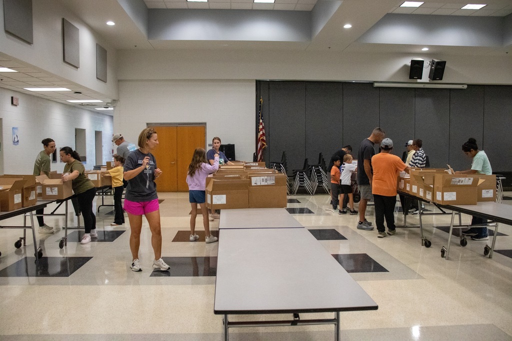 volunteers sorting materials