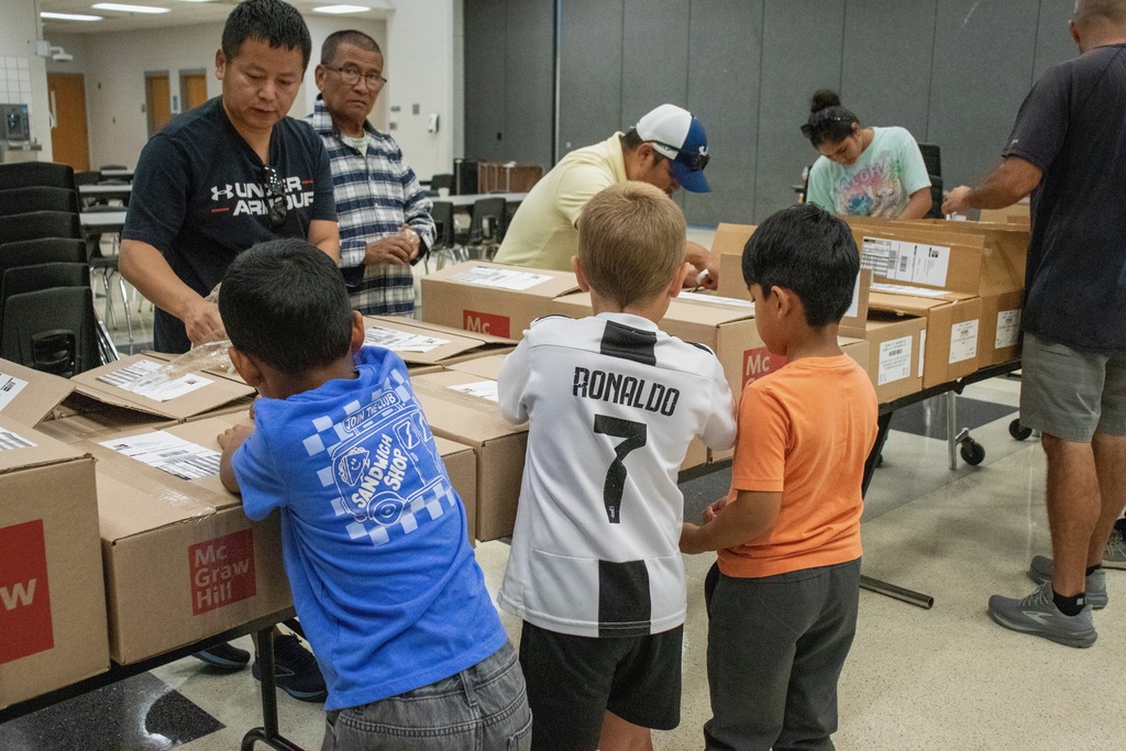 volunteers opening boxes 