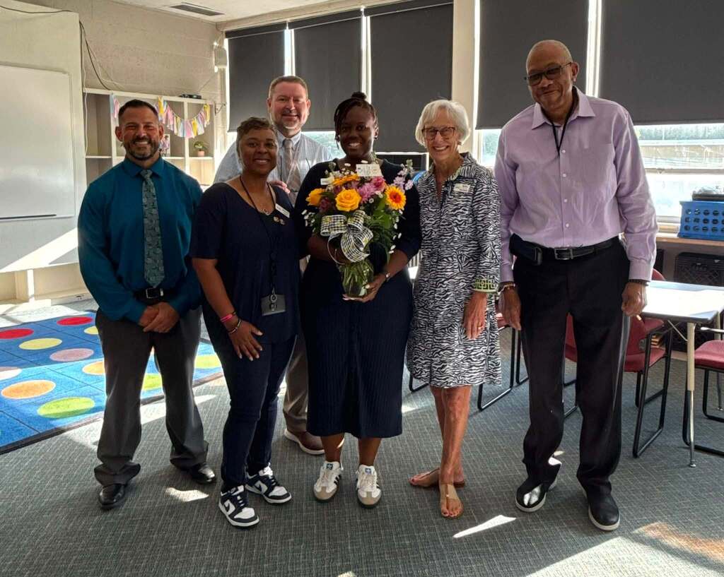 AP of the year holding flowers