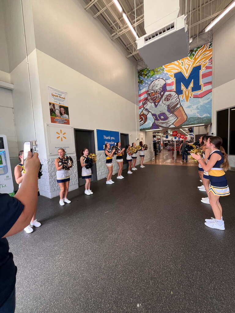Western Rockingham Middle School cheerleaders at the Mayodan Walmart Stuff-the-Bus event