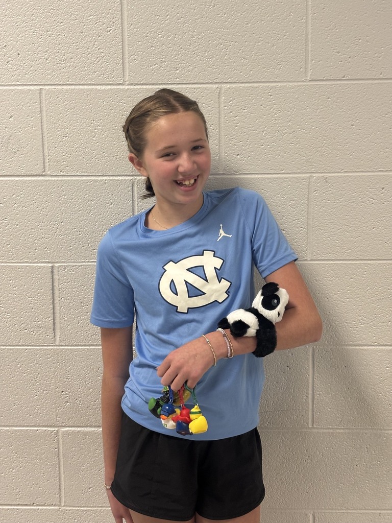 student with a panda slap bracelet prize