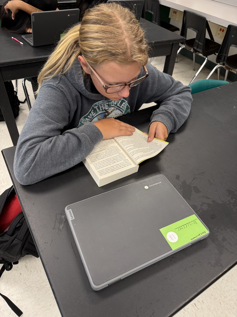 student reading independently