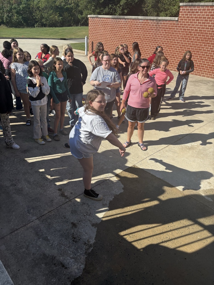 kids throwing at the dunk tank