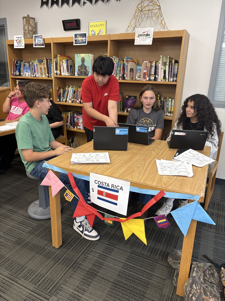 students at stations