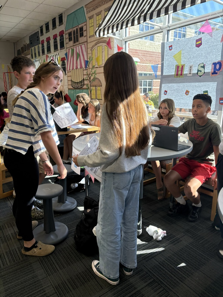 students at stations