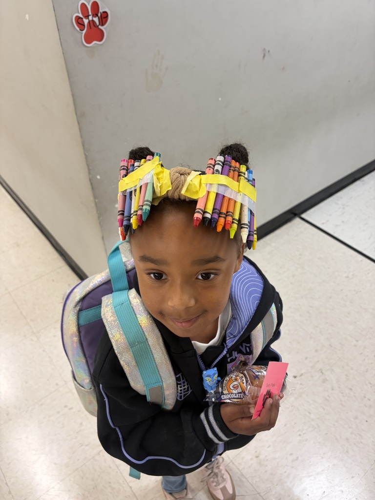 Red Ribbon Week! Central Elementary School female student with crayons in her hair