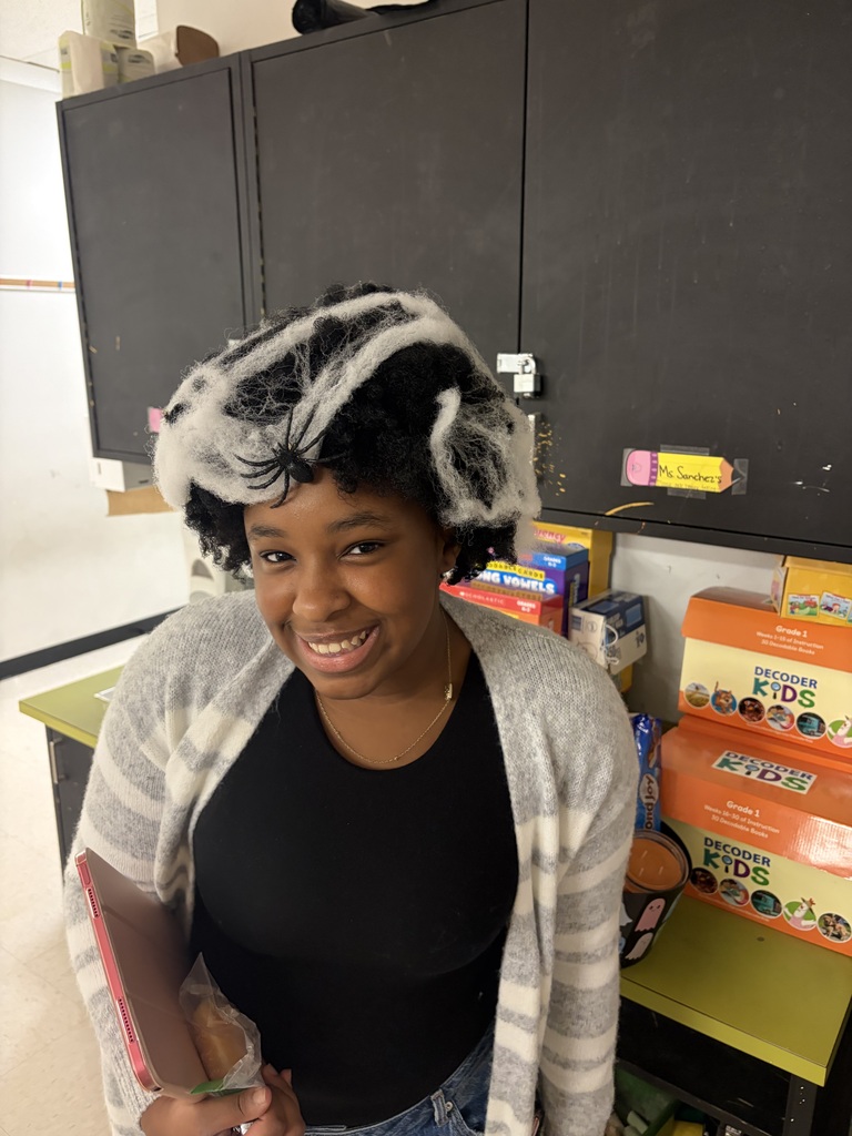 Red Ribbon Week! Central Elementary School teacher with spider web decor in her hair