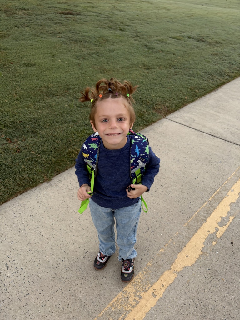 Red Ribbon Week! Central Elementary School student with hair in several pigtails held by colorful rubber bands