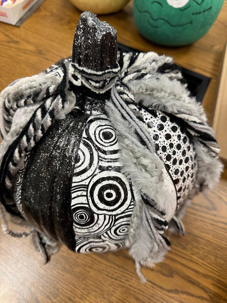 Rockingham County Middle pumpkin- A pumpkin painted black and white with black and white ribbons