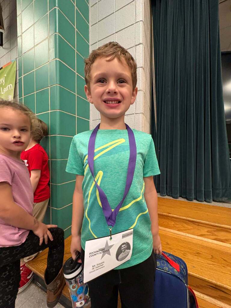 Red Ribbon Week- Lincoln Elementary Dress like a student/teacher day: a little boy wearing a lanyard with his picture and name, dressed as a teacher