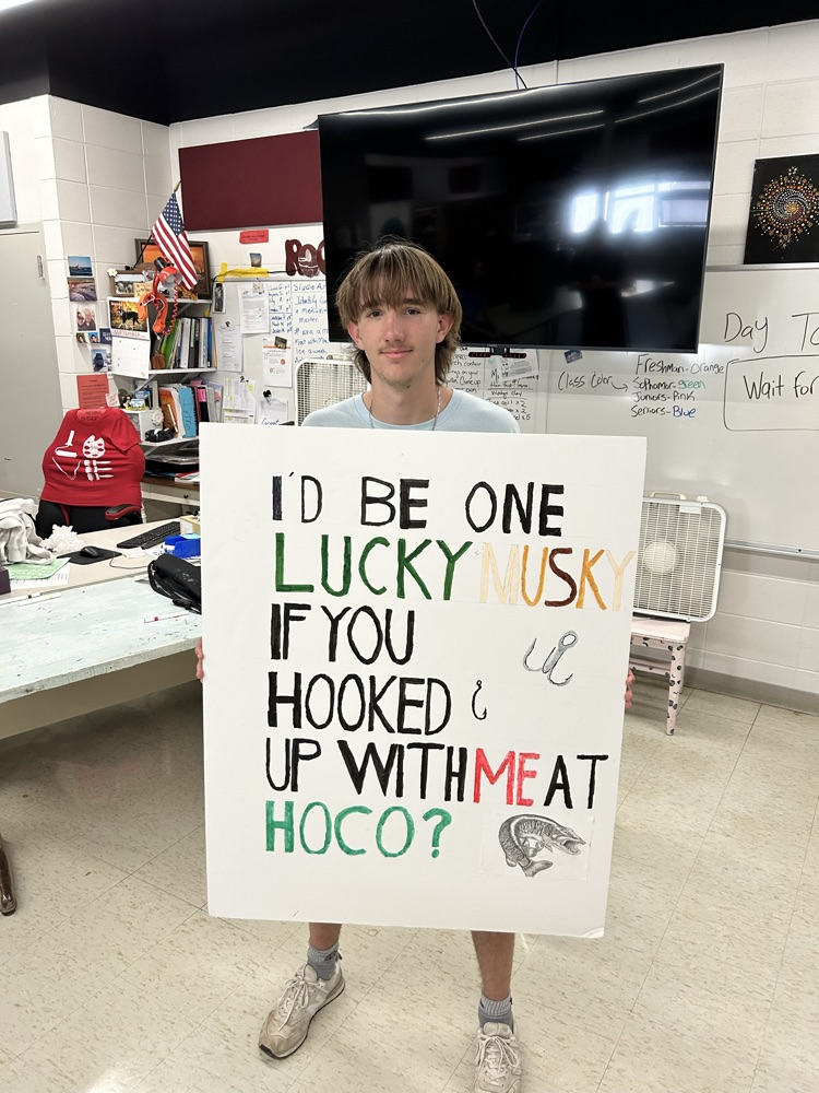 Landon and his homecoming sign!