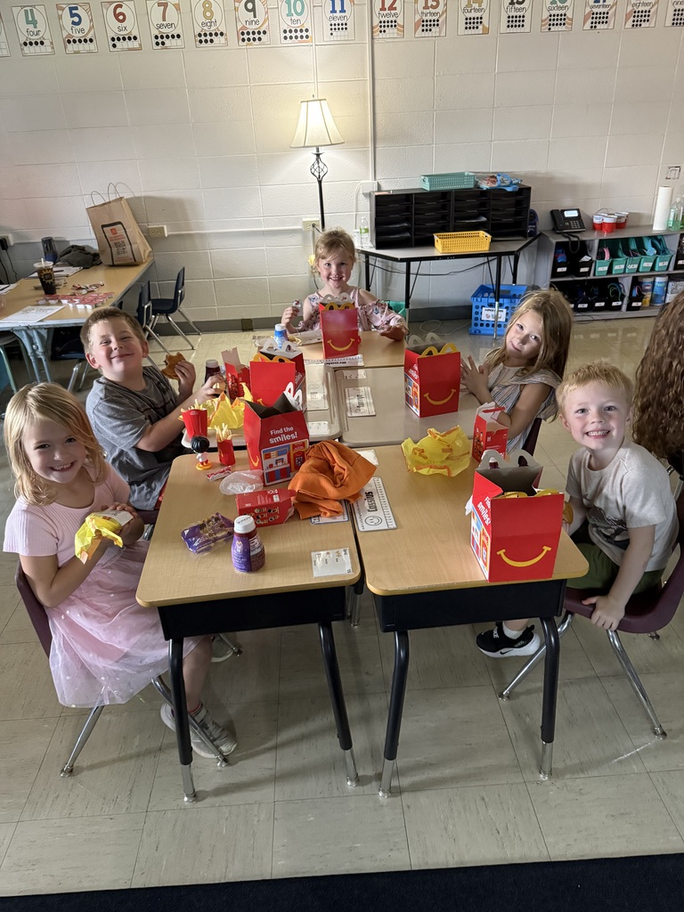 The students are enjoying the happy meals together!