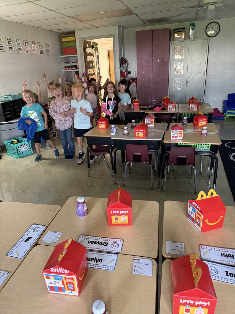 The students are walking into the room and seeing the happy meal surprises on their desks!