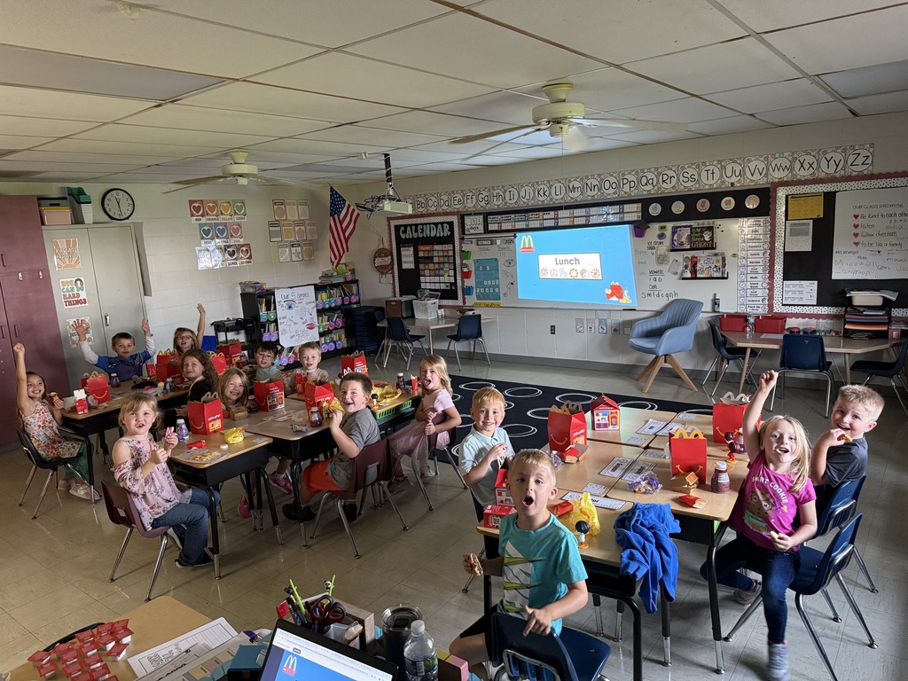 The students are enjoying the happy meals together!