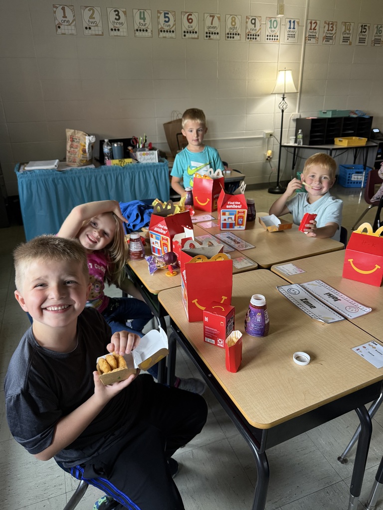 The students are enjoying the happy meals together!