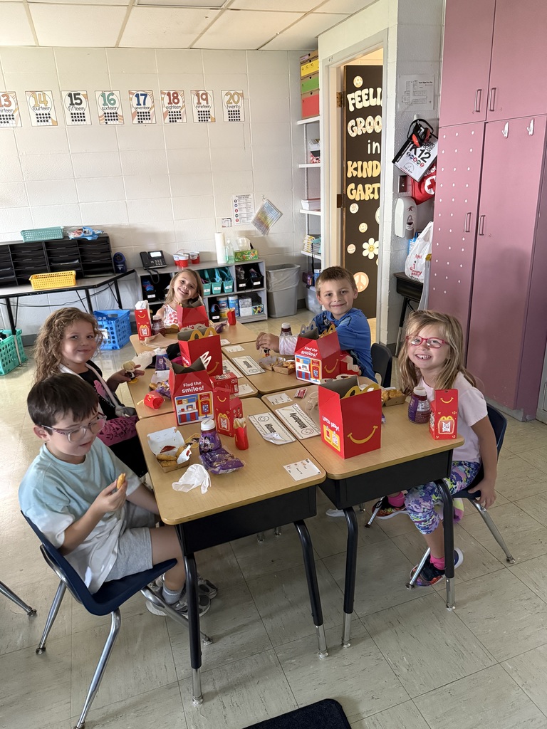The students are enjoying the happy meals together!