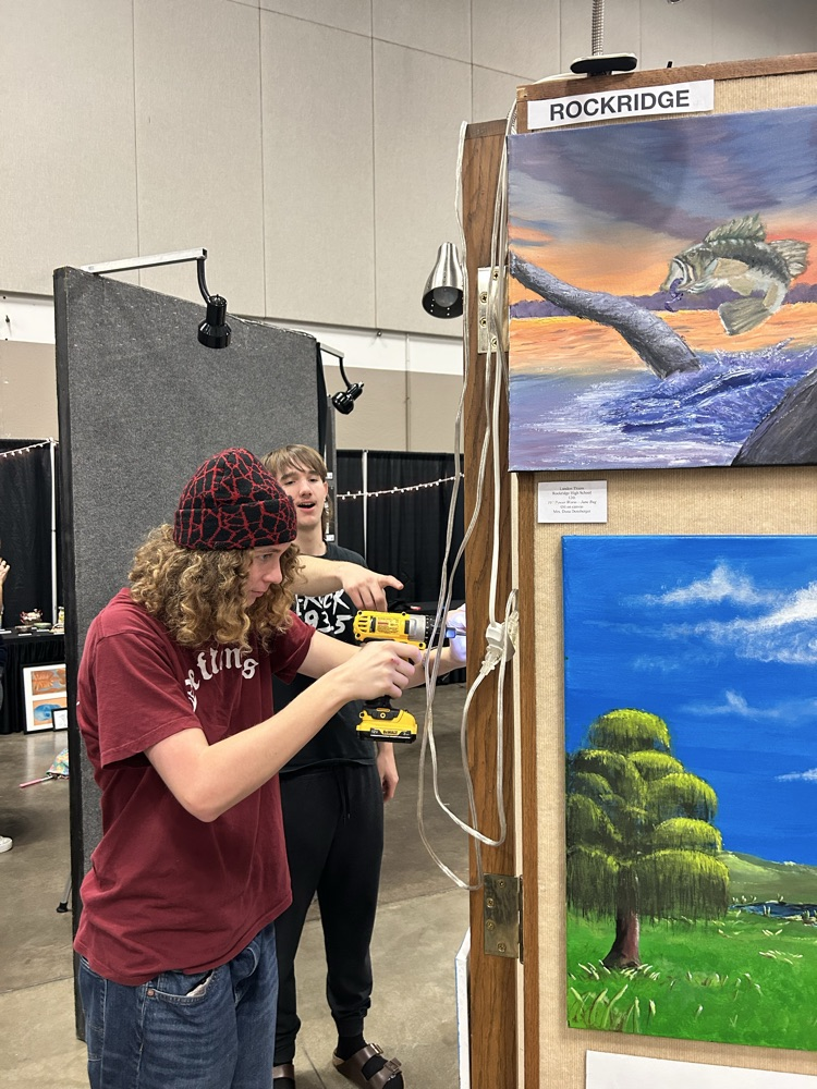 Noah and Landon helped me install the artwork! 