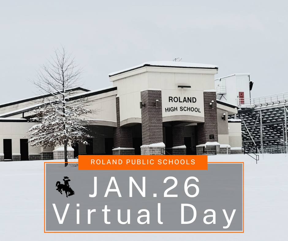 Snow-covered exterior of Roland High School with text reading “Roland Public Schools – Jan. 26 Virtual Day.”