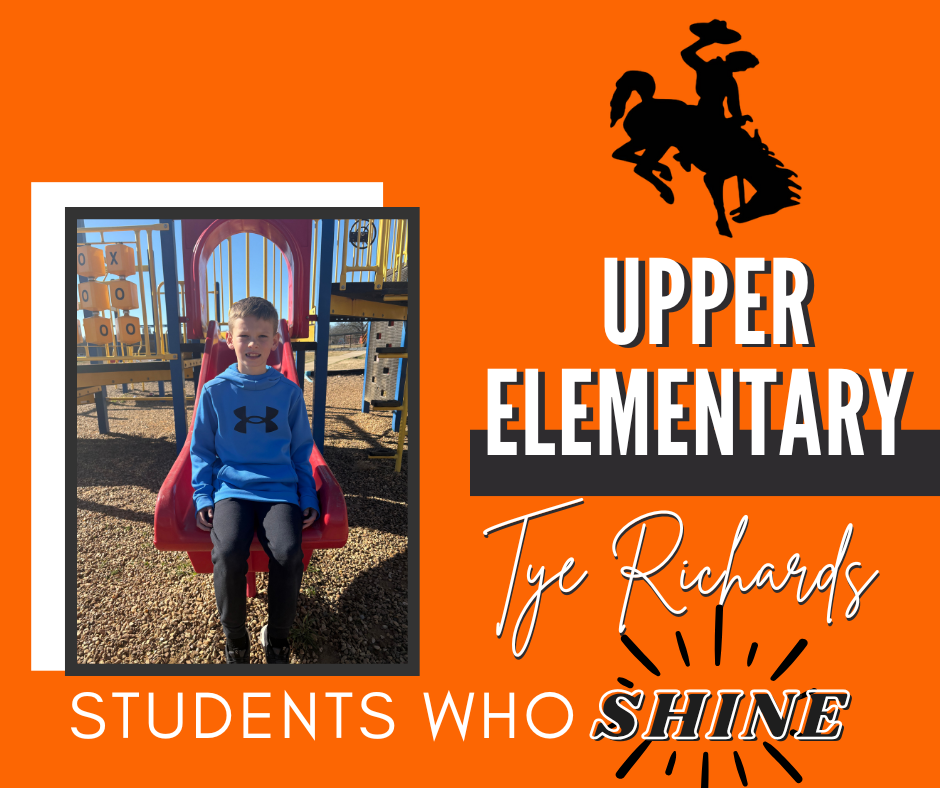 Upper Elementary students smiling while being recognized as January STAR Students at school.