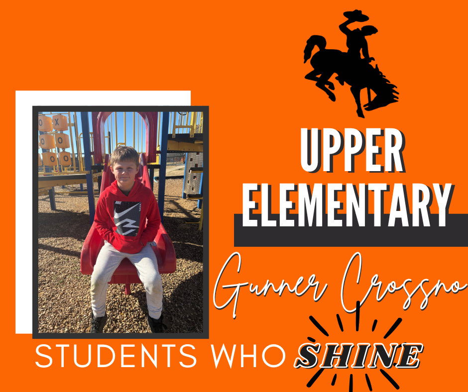 Upper Elementary students smiling while being recognized as January STAR Students at school.