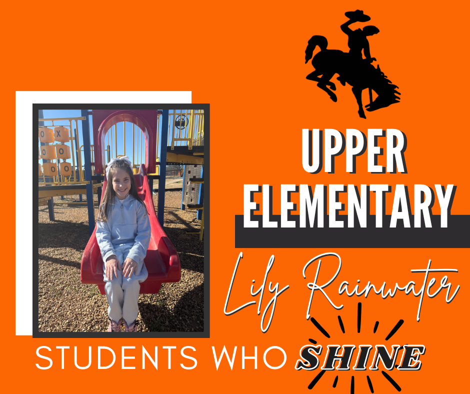 Upper Elementary students smiling while being recognized as January STAR Students at school.