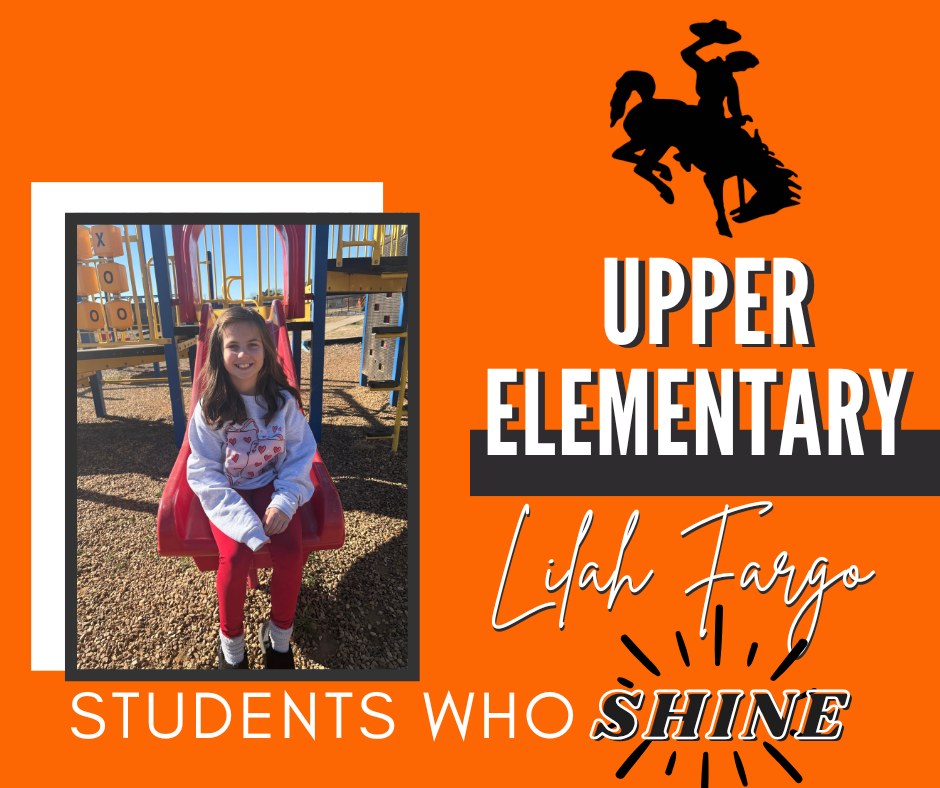 Upper Elementary students smiling while being recognized as January STAR Students at school.