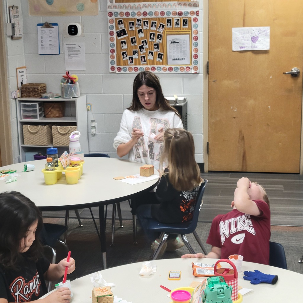 Roland High School culinary students work alongside lower elementary students to create Halloween-themed haunted houses. Students enjoy working together, decorating their houses, and getting creative with their designs.