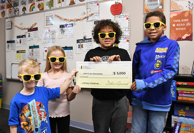 John Joy students pose with the Dollar General Literacy Grant award.