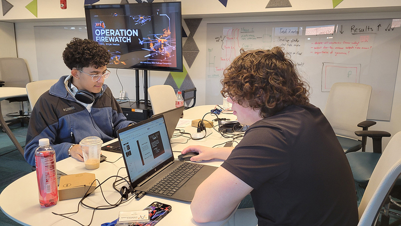 RFA seniors Timothy Hill and Elijah Pomales hard at work during  the 2026 AFRL Challenge Competition.