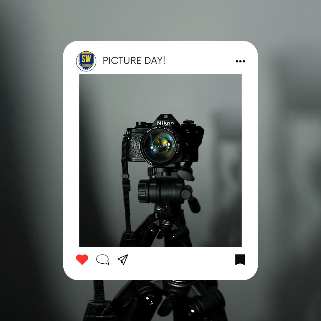 A picture of a camera within a Polaroid frame. The polaroid frame says "PICTURE DAY"